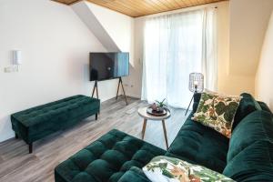 Posezení v ubytování Moselweingut & Gästehaus Hubertushof