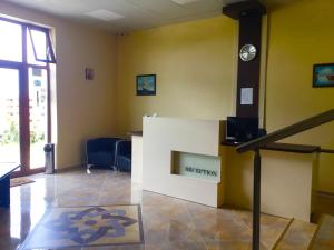 a waiting room with a sign on the wall at Къща за гости Емона,Обзор in Obzor