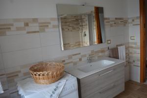 Koupelna v ubytování Appartamento Gennirco