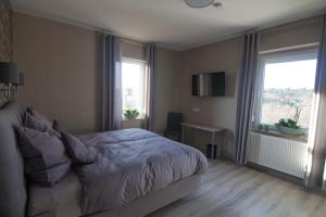 Postel nebo postele na pokoji v ubytování Villa Kopp-Das Gästehaus