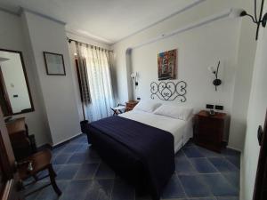Postelja oz. postelje v sobi nastanitve Hotel Corallo Sperlonga