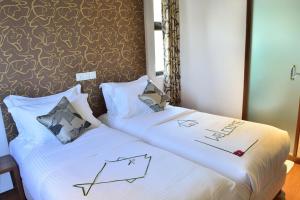 Letto o letti in una camera di Turquoise Residence by UI