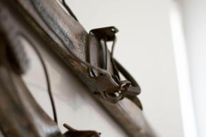 a close up of a clock on a wall at Rustico alla Quercetta in Verona