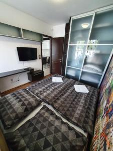 Łóżko lub łóżka w pokoju w obiekcie Black Brothers Wellness Apartments