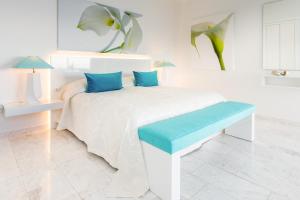 A bed or beds in a room at Jardin de la Paz