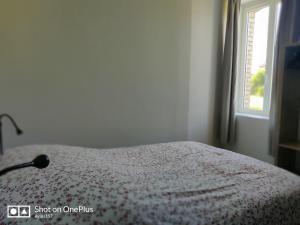 Postel nebo postele na pokoji v ubytování Au 157 - Locations Contrexéville