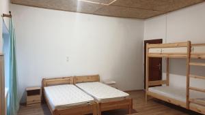 Postel nebo postele na pokoji v ubytování Larida Vendégház