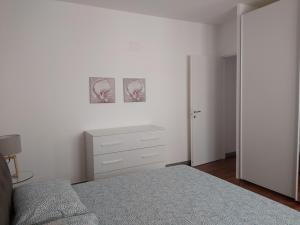 Posteľ alebo postele v izbe v ubytovaní Beach House