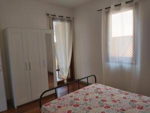 Posteľ alebo postele v izbe v ubytovaní Beach House