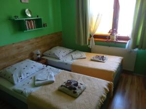 Postel nebo postele na pokoji v ubytování Pod Kokornakiem