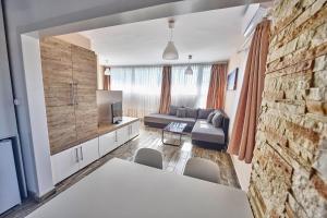 Atpūtas zona naktsmītnē Panoráma City Apartman