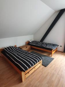 
Łóżko lub łóżka w pokoju w obiekcie Apartamenty Laskowa - Zator / Energylandia
