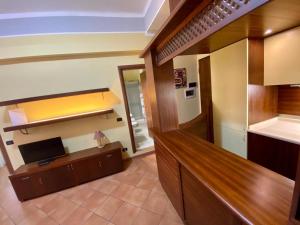 A kitchen or kitchenette at Nel Sole bilocale Még 7 kép