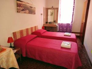 Postel nebo postele na pokoji v ubytování Casa Favaretto Guest House