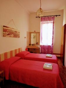 Postel nebo postele na pokoji v ubytování Casa Favaretto Guest House
