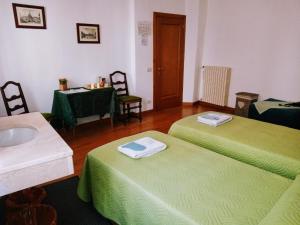 Postel nebo postele na pokoji v ubytování Casa Favaretto Guest House