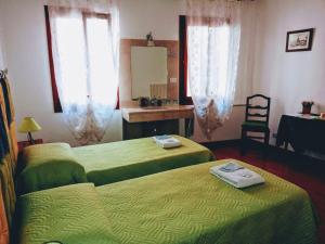 Postel nebo postele na pokoji v ubytování Casa Favaretto Guest House