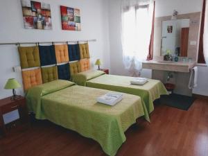 Postel nebo postele na pokoji v ubytování Casa Favaretto Guest House
