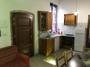 Köök või kööginurk majutusasutuses Alle case il pozzetto