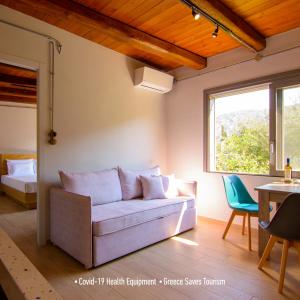 A seating area at Villa Douloumi