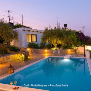 The swimming pool at or close to Villa Douloumi