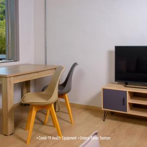 A television and/or entertainment centre at Villa Douloumi