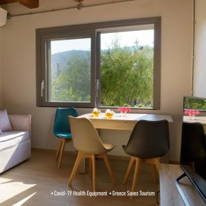 A seating area at Villa Douloumi