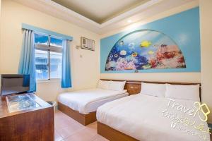 Voodi või voodid majutusasutuse Blue Sea Romance B&B toas