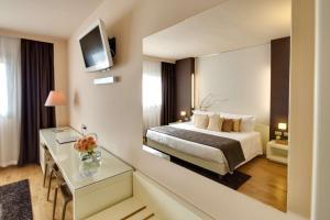 Ein Bett oder Betten in einem Zimmer der Unterkunft Best Western Plus Leone di Messapia Hotel & Conference