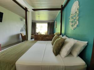 Voodi või voodid majutusasutuse Yellow Tree Suites toas