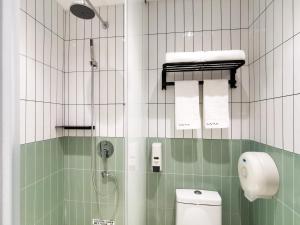 Koupelna v ubytování Roomix Shanghai