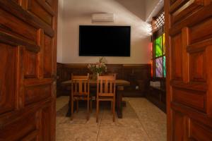 TV a/nebo společenská místnost v ubytování NaNa Vida Hotel Morelia