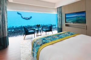 Pullman Maldives Maamutaa - All-Inclusive Resort - 50 percent off Transfers - kids below 12 years old can dine free客房内的一张或多张床位