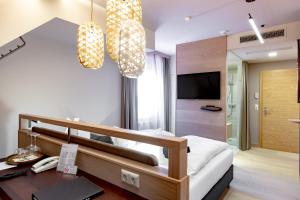 Łóżko lub łóżka w pokoju w obiekcie Hotel Nationalpark
