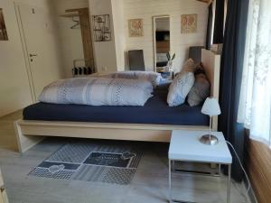 Postel nebo postele na pokoji v ubytování B&B Leonhard 7