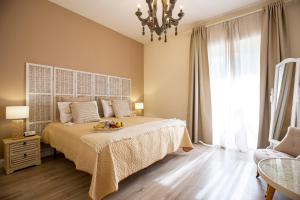 Postel nebo postele na pokoji v ubytování Twins House Sorrento