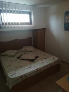 Postel nebo postele na pokoji v ubytování Pensiunea Lyo