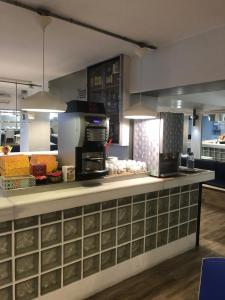 Kuchyň nebo kuchyňský kout v ubytování Colors + 39 fotografií