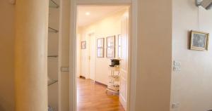 a hallway with a door leading into a room at Stylish room in milano in Milan