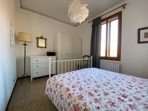 Postel nebo postele na pokoji v ubytování Calle San Giacomo Apartment