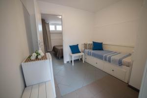 Een bed of bedden in een kamer bij Villa Lara