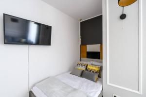 Säng eller sängar i ett rum på Andersa 10 by Homeprime