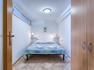 Posteľ alebo postele v izbe v ubytovaní Apartment Nika-4 by Interhome