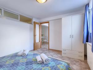 Posteľ alebo postele v izbe v ubytovaní Apartment Nika-4 by Interhome