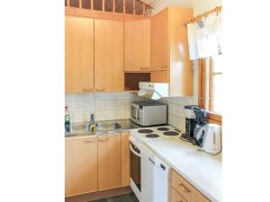 Kuchyň nebo kuchyňský kout v ubytování Holiday Home Keltalilja by Interhome + 8 fotografií