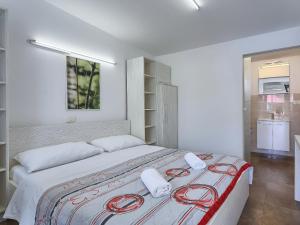 Postel nebo postele na pokoji v ubytování Apartment Nika-10 by Interhome