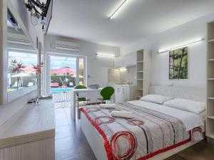 Postel nebo postele na pokoji v ubytování Apartment Nika-10 by Interhome