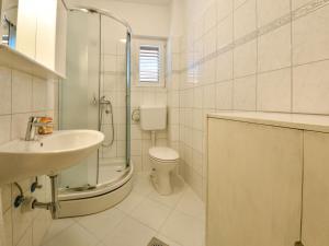 Koupelna v ubytování Holiday Home Mia by Interhome