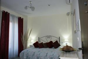 Posteľ alebo postele v izbe v ubytovaní Hotel Rural Molino del Puente Ronda