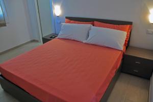 Een bed of bedden in een kamer bij Villa Lara